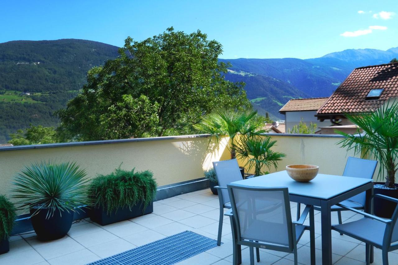 Apartment Cascada - Alpstay Parcines Bagian luar foto